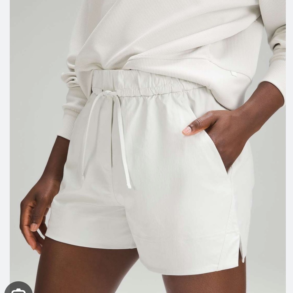 Lululemon | Cinchable Waist‎ High-Rise Woven Shorts in Bone.